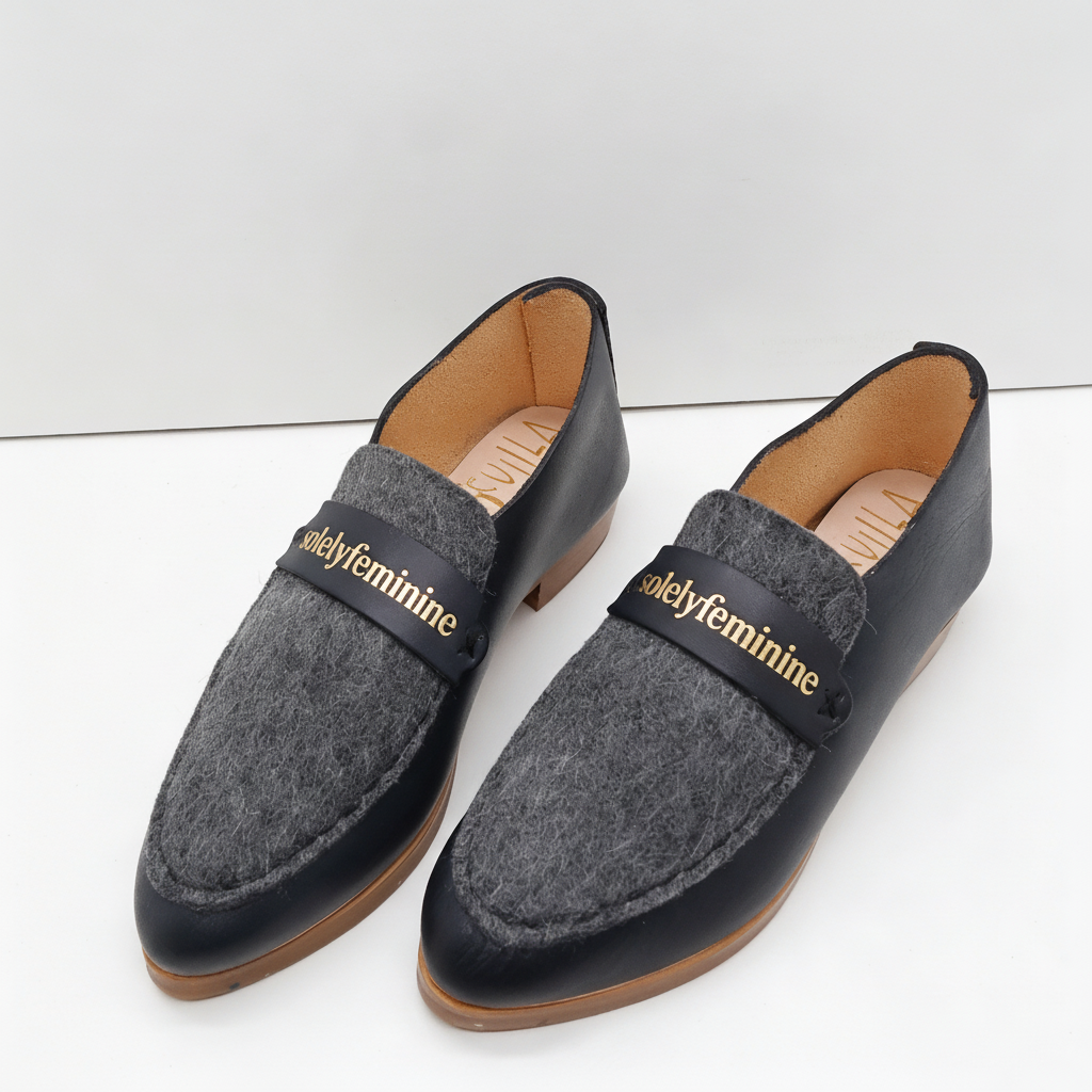 THE PENNY. BB NORI. DARK GREY FELTED WOOL W NORI MASK. BLACK THREAD. EDGE INKED. 2CM